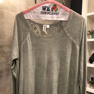 Super soft and flowing split back top